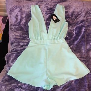 Mint green V neck romper from Fashion Nova